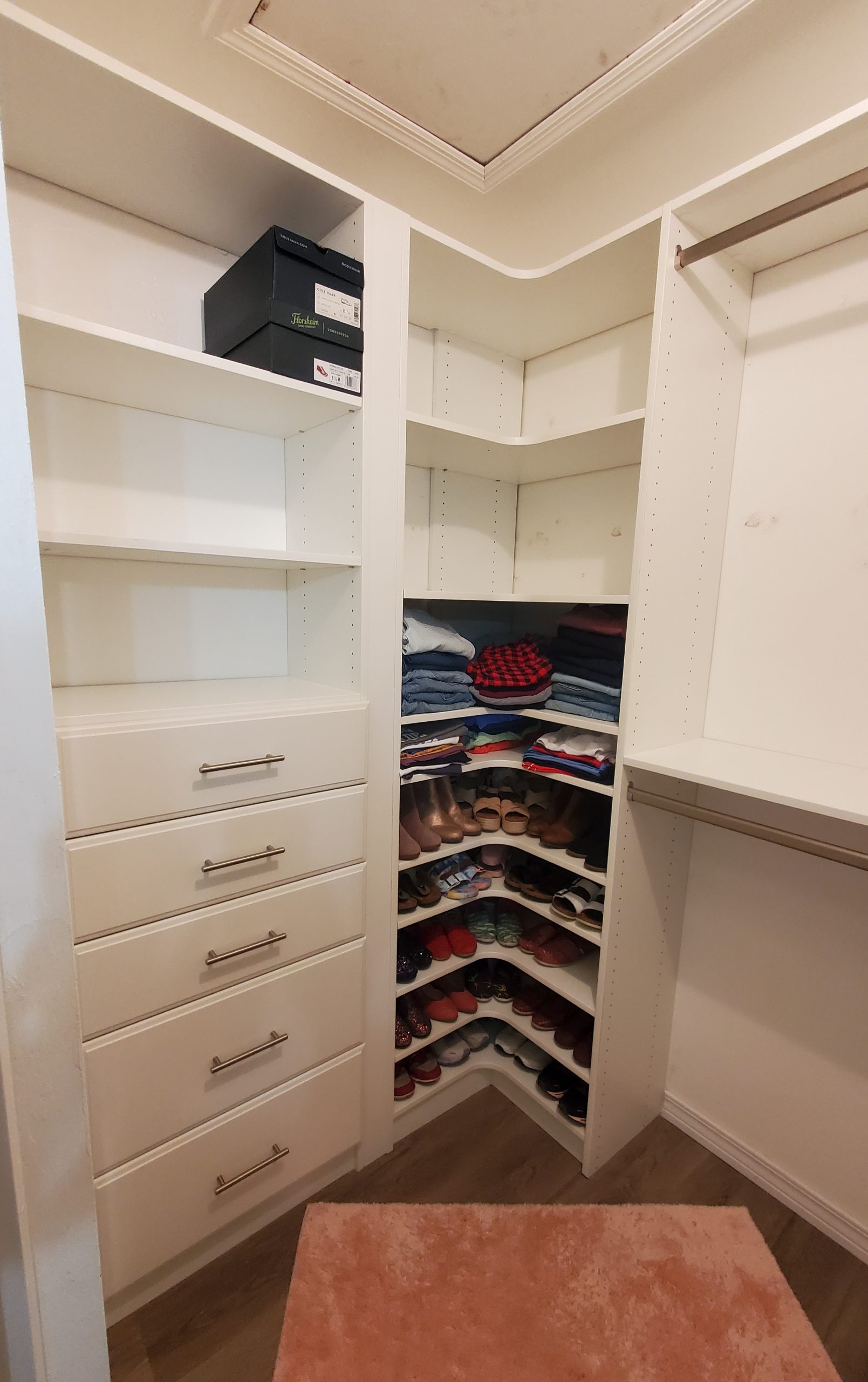 Walk-in closet shelving and shoe storage